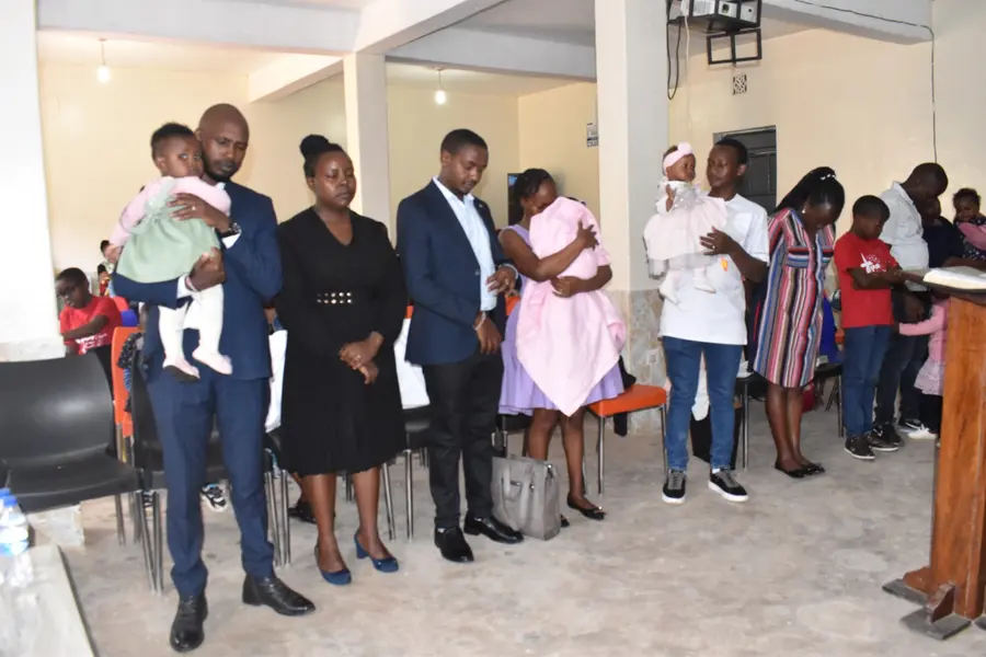 Family during child dedication